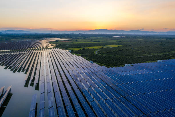 istock Huge solar farm with sunset view 1331118511