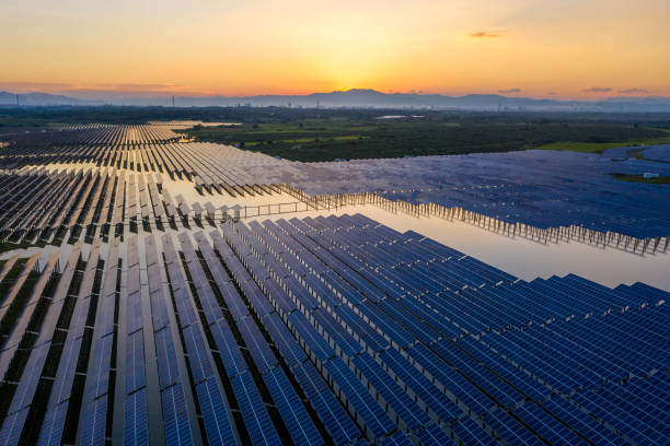 istock Huge solar farm with sunset view 1331118541