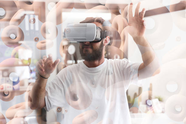 istock Man Wearing virtual reality glasses in Office 1331121507