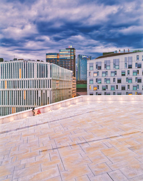 Panoramic view over modern city building in Oslo after sunset, Norway. The night is still illuminated by blue light because of the midnight-sun effect over the north polar circle.