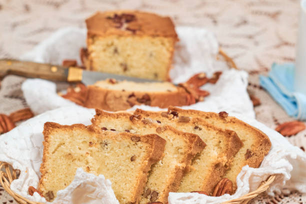 istock Homemade walnut bread sliced in wooden baskets. Walnuts around. 1331131141