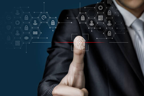 istock Businessman scans a fingerprint on a virtual screen. 1331132464