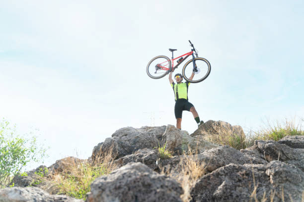 istock Athlete feeling happy on top of a mountain 1331133194