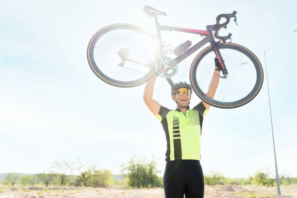 istock Cheerful cyclist laughing after winning 1331133301