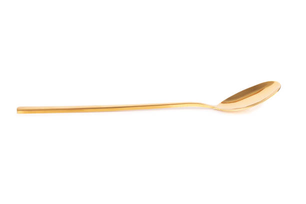 istock spoon brass gold isolated on white background 1331134430
