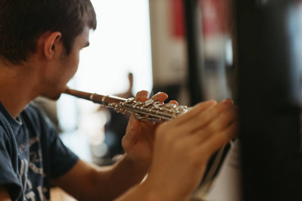 istock Portrait Of Man Playing Guitar 1331138230