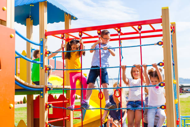 istock Kids Playing In Playground 1331141832