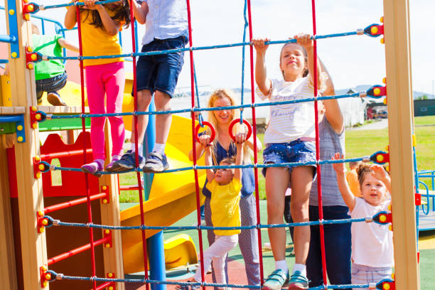 istock Kids Playing In Playground 1331141845