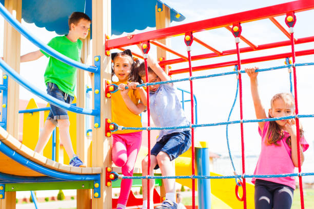 istock Kids Playing In Playground 1331141855