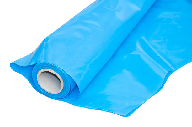 istock Polyethylene vapour barrier roll to protect roof from problems caused by condensation - image on white background for easy selection 1331143614