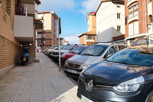 Castro Urdiales, Cantabria, Spain - Julio 16, 2021: Street Arturo Duo Vital with parked cars in  Castro Urdiales. Spain