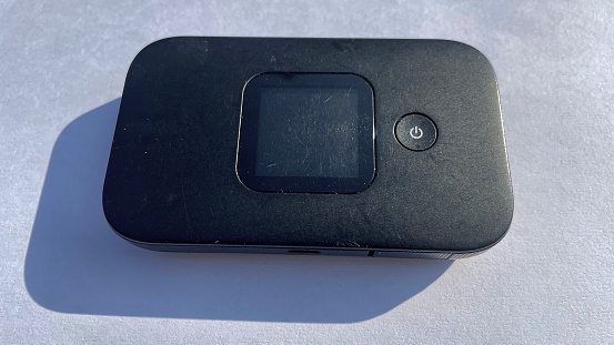 Closeup view of black mifi device on the white background