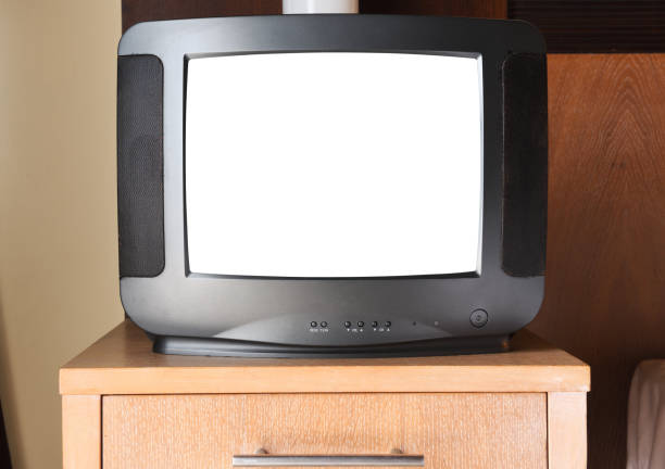istock An old black TV with a white screen for adding images is on the bedside table in the apartment. Vintage TVs 1980s 1990s 2000s. 1331151037