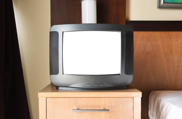 istock An old black TV with a white screen for adding images is on the bedside table in the apartment. Vintage TVs 1980s 1990s 2000s. 1331151045