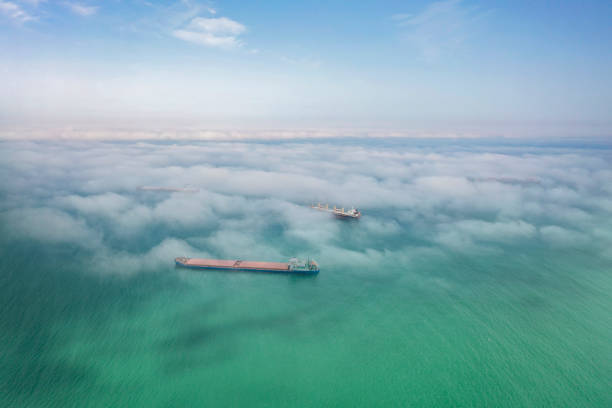 istock Low Clouds Over Black Sea. Fog over sea 1331154857