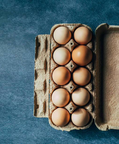 Table Top View of Eggs in Carton Box