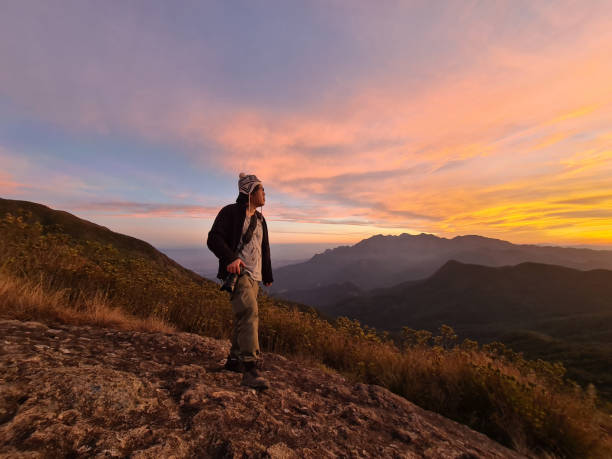 istock Tourist mountain sunset winter 1331171694