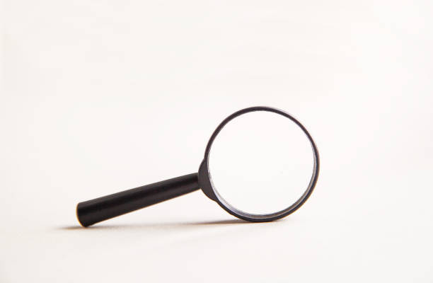 istock Magnifying glass, isolated on a white background 1331175943