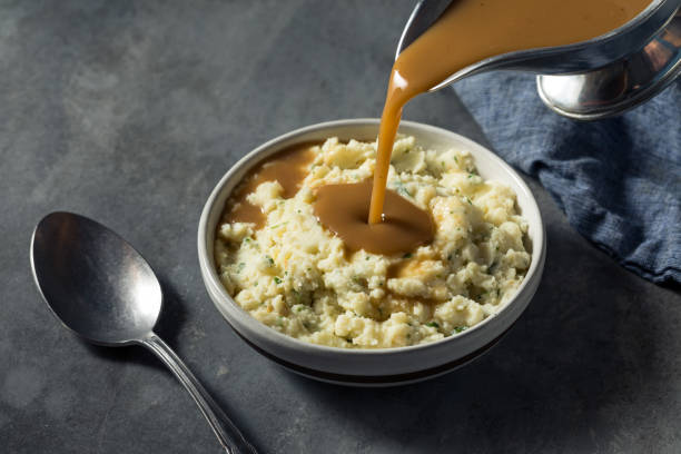 istock Healthy Homemade Creamy Mashed Potatoes with Gravy 1331176943