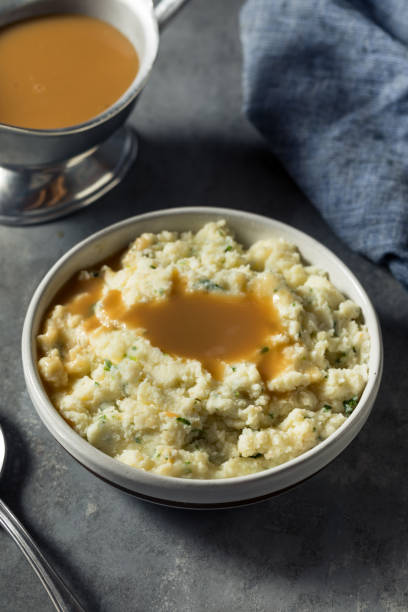 istock Healthy Homemade Creamy Mashed Potatoes with Gravy 1331176945