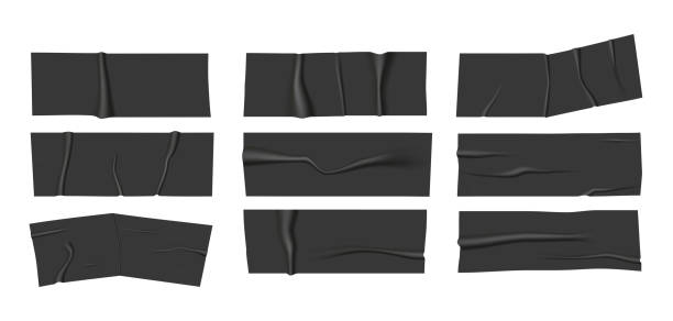 istock Realistic wrinkled black adhesive tape. Vector scotch pieces. 1331176958