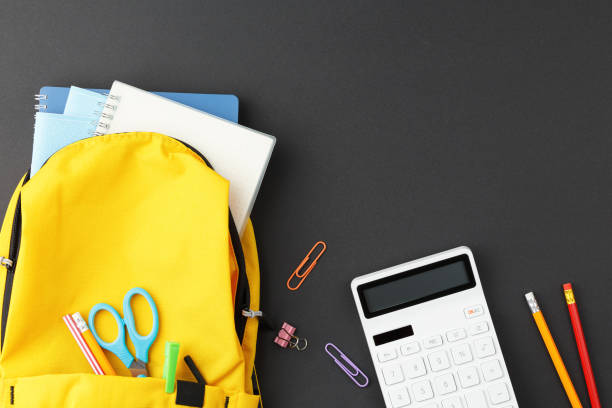 istock School supplies in a yellow backpack 1331179737