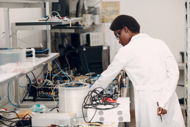 istock Scientist african american woman working in laboratory with electronic instruments 1331184471