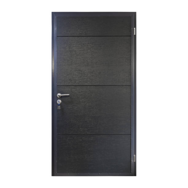 istock Black metal front door isolated 1331184857