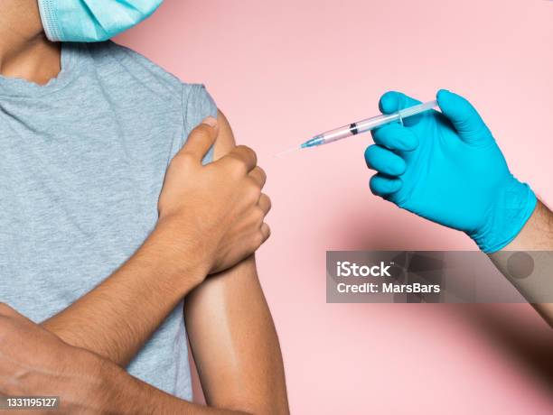 Young Man Refusing Vaccine Anti Vaccination Concept Stock Photo - Download Image Now