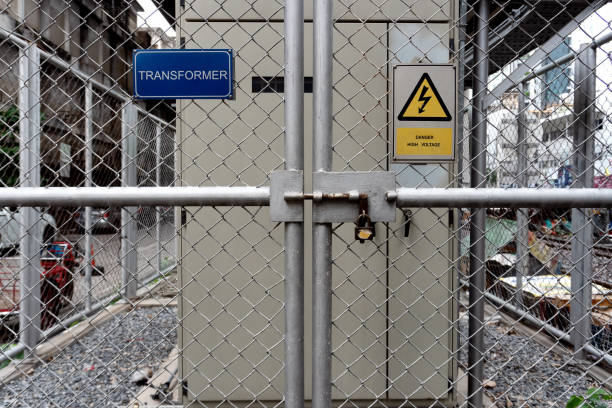 istock Transformer station in the chain-link fence security around and area danger 1331199375
