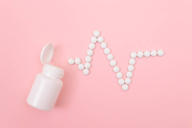 istock Heartbeat Rhythm. ECG Line Made from White Pills. Pharmaceutical Industry 1331200397