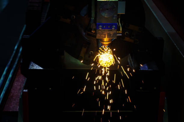 istock Close-up Punching stainless steel tube laser cutting machine control by cnc program 1331200445