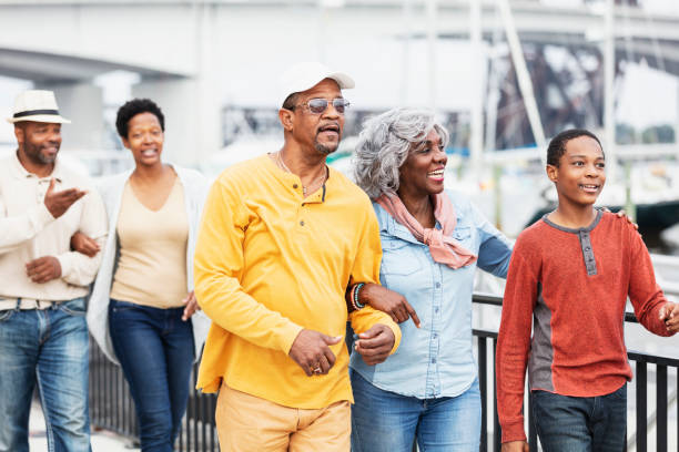 Multi-generation African-American family on waterfront
