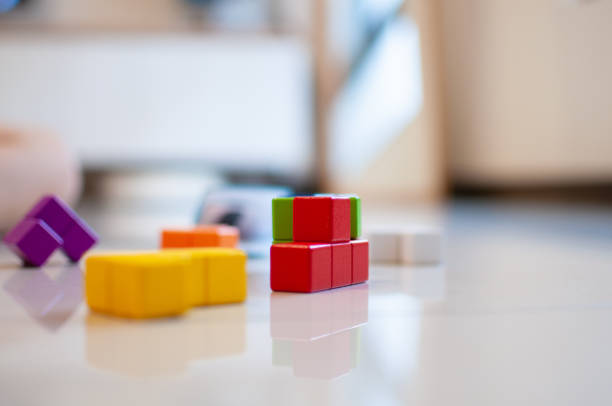 istock Child's wooden blocks on the floor. 1331205833
