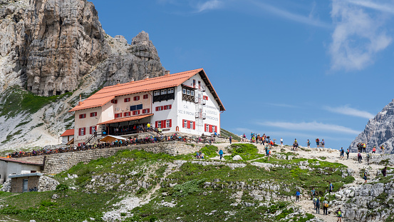 View of the Locatelli mountain lodge. It's one of the main destination close to the 3 Cime of Lavaredo. Hikers destination. Summer time. Italian Alps. Dolomites