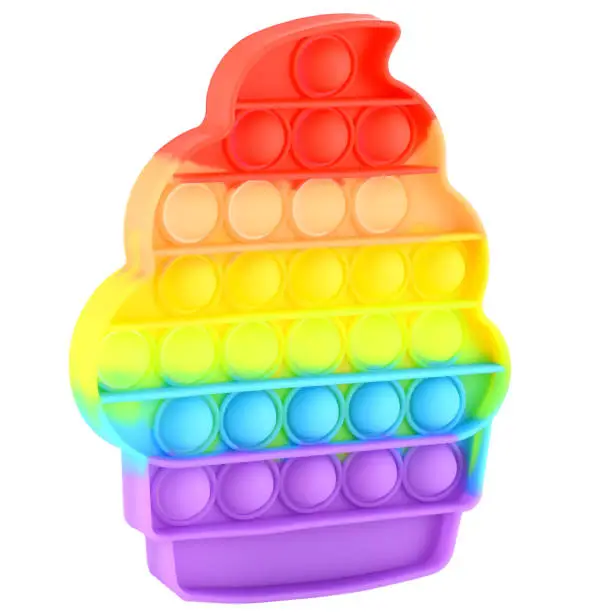 Photo of Pop it silicone rainbow anti-stress toy isolated on white background. Simple dimple, popular modern stress relief toys for adults and children. Fidget kid toy, Pop Bubble Fidget