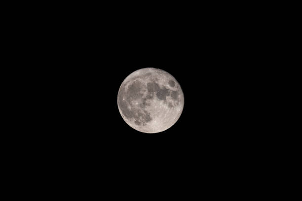istock Full moon on the dark night sky 1331221189