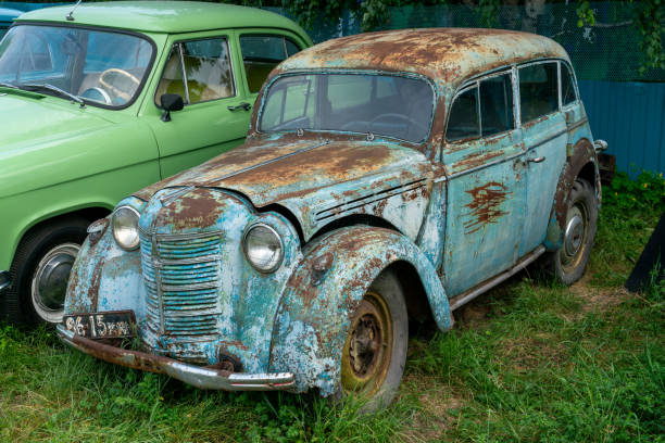 Abakan, Russia 07.27.2021: Rusty passenger retro car before the restoration procedure