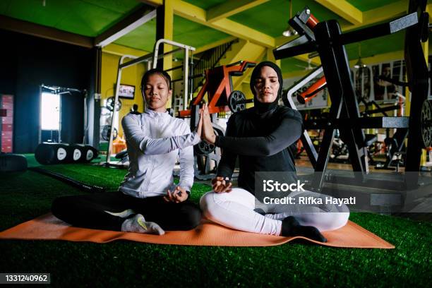Mother And Daughter Yoga At Gym Stock Photo - Download Image Now - Gym, Health Club, Daughter