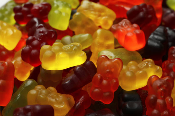 istock Delicious gummy bear candies as background, closeup 1331241046