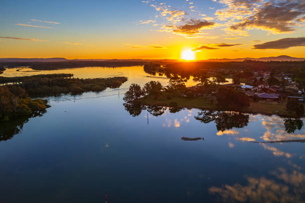 istock Ohmas Bay Sunset with Clouds and Reflections 1331242847
