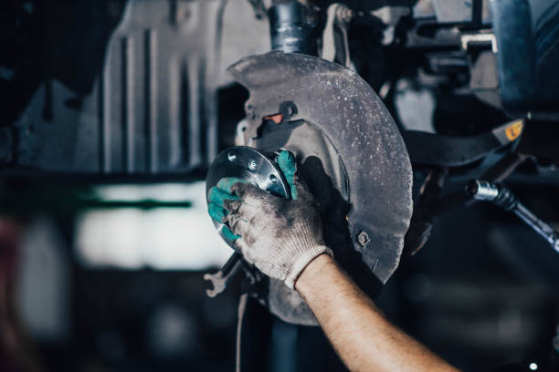 istock man changes a wheel hub with a wheel bearing in a car 1331243260