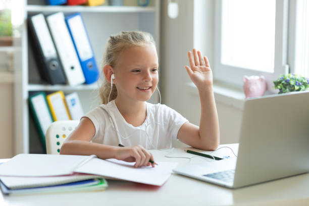istock Young girl uses her laptop teleconferencing 1331244220