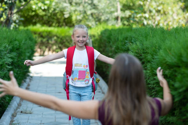 istock Happy kid running into mother’s hug 1331244325