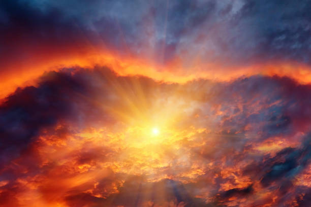 istock Dramatic blue-red sky with bright yellow sun. 1331245860