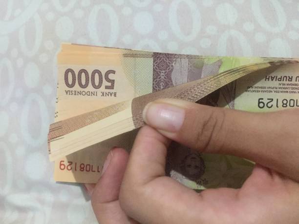 istock Five thousand rupiah banknotes (Rp. 5.000,00) as the prevailing medium of exchange in Indonesia. 1331246939