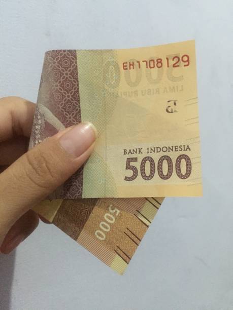 istock Five thousand rupiah banknotes (Rp. 5.000,00) as the prevailing medium of exchange in Indonesia. 1331246940