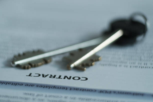 istock A contract with a car key on the table. 1331247306
