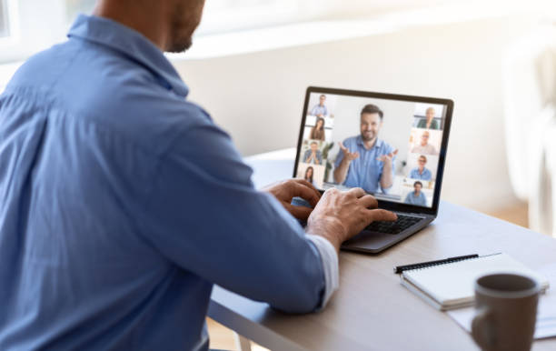 istock Remote Communication. Unrecognizable Businessman Teleconferencing With Colleagues, Using Laptop Computer In Office 1331248043