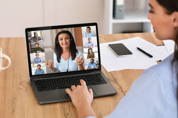 istock Distant Communication. Woman Joined Video Conference With Colleagues While Working In Office 1331248246
